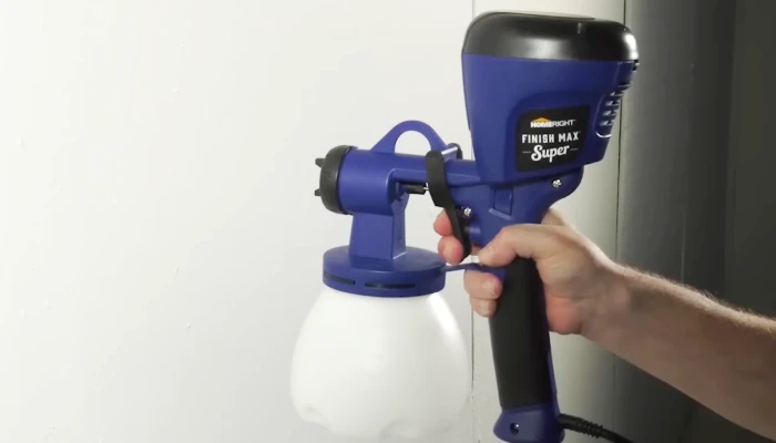 Is it better to spray or roll paint on cabinets